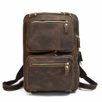 Brown leather backpack backpack with multiple zippered pockets for travel
