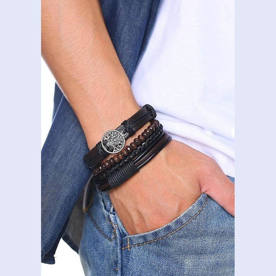 Stylish leather beaded bracelets for men stacked with a vintage watch on a casual outfit