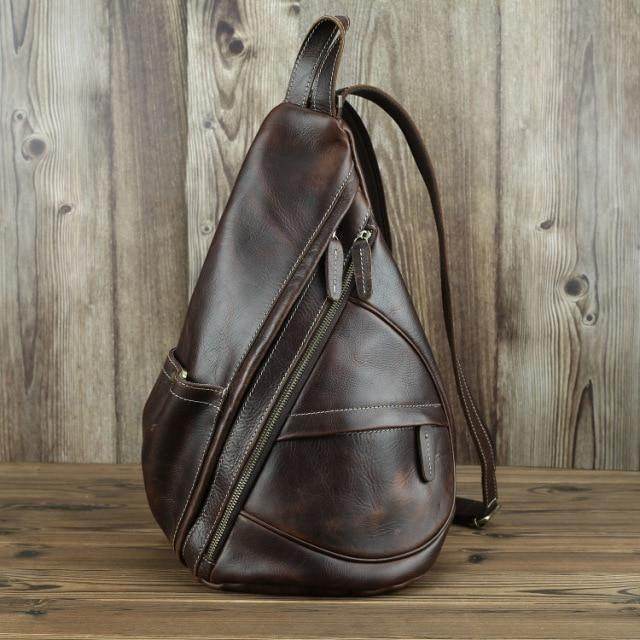 Stylish leather black sling bag with multiple compartments for modern convenience