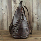 Leather black sling bag with stylish design and adjustable strap for everyday use