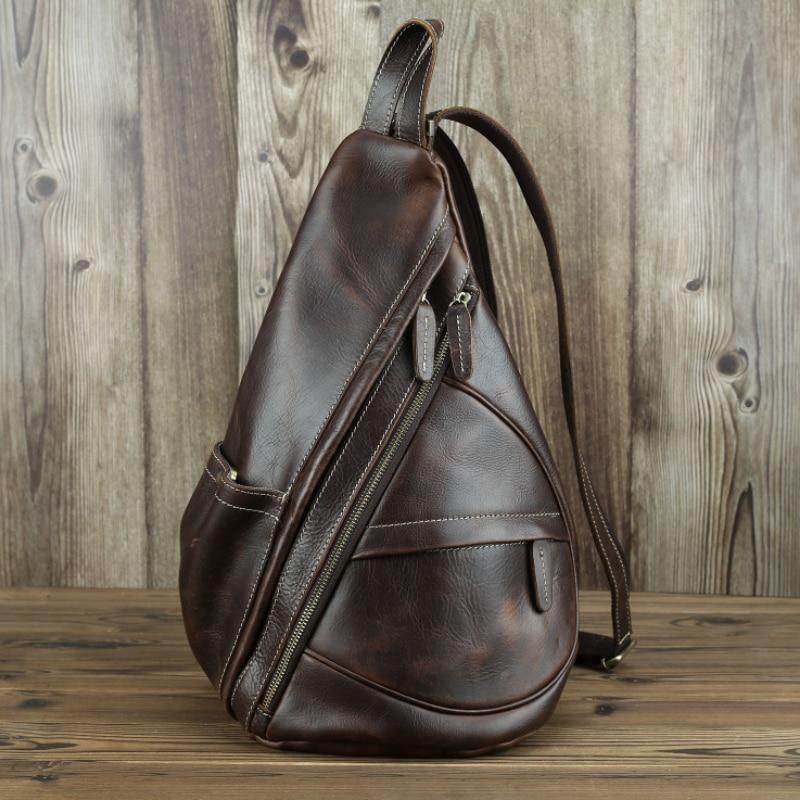 Leather black sling bag with stylish design and adjustable strap for everyday use