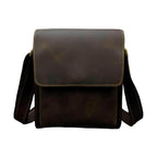 Durable brown leather briefcase for professionals with adjustable shoulder strap and classic design