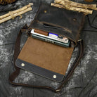 Detailed view of a VacationGrabs leather briefcase for professionals with interior pockets and a soft lining