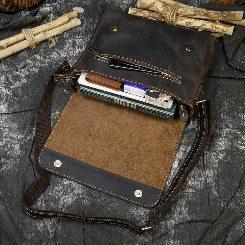 Detailed view of a VacationGrabs leather briefcase for professionals with interior pockets and a soft lining
