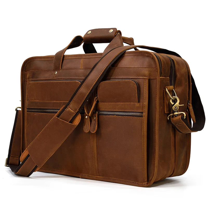 Brown leather briefcase with multiple pockets for business use