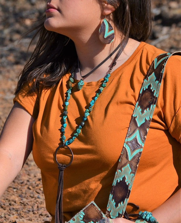 Stylish leather choker with African turquoise paired with matching earrings for a trendy look