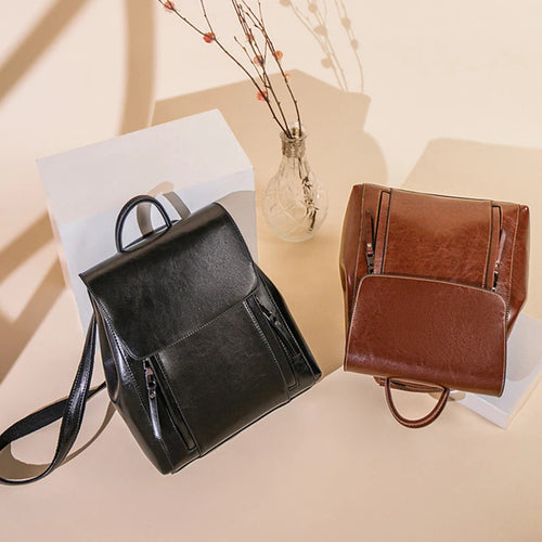 Leather crossbody mini bag in black and brown for stylish outings