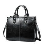 Black leather crossbody mini bag with adjustable strap for everyday use