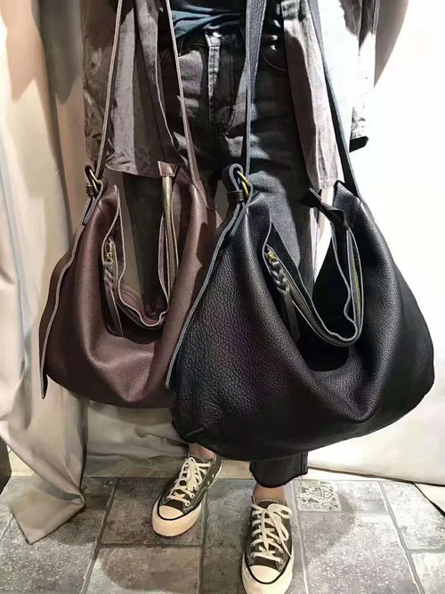 Leather crossbody mini bag in brown and black for stylish outings