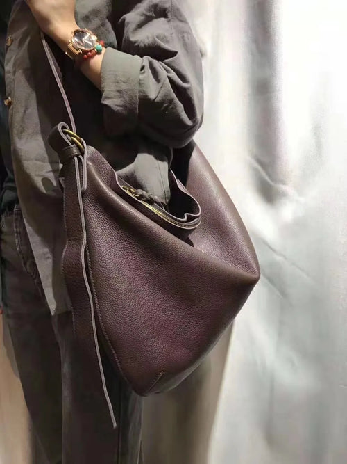 Leather crossbody mini bag in deep brown, perfect for casual outings