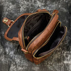 Brown leather crossbody mini bag with multiple zippered compartments