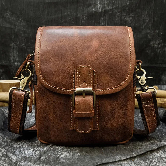 Brown leather crossbody mini bag with adjustable strap for daily use