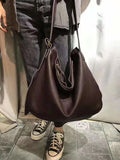 Women's brown leather crossbody mini bag for casual outings