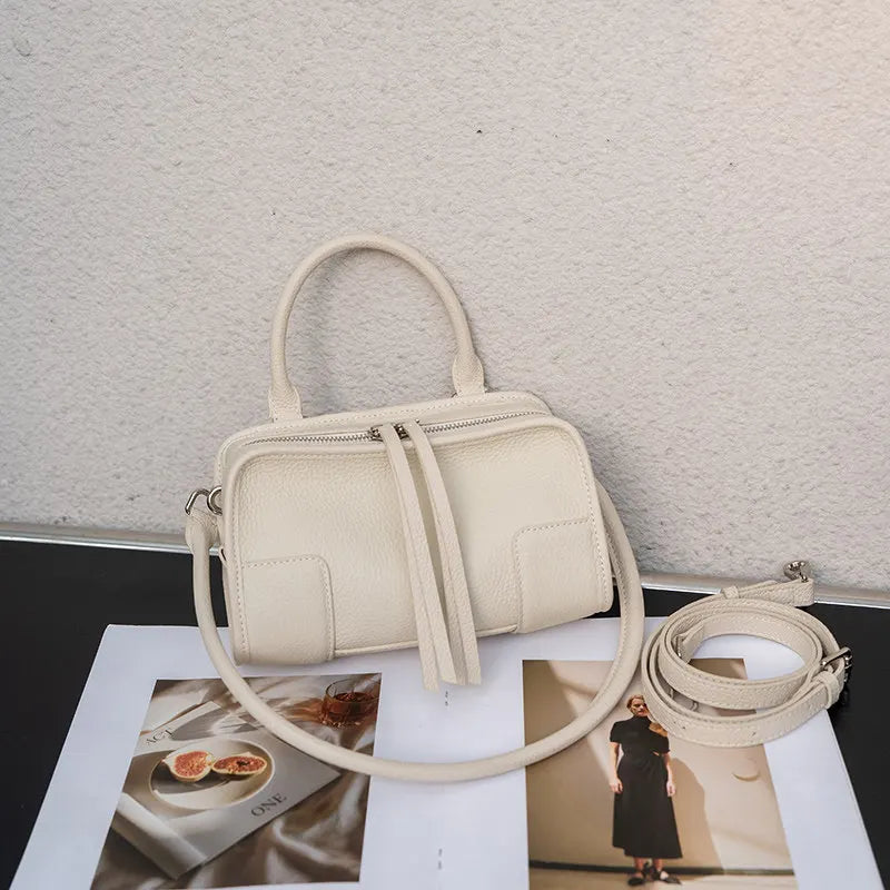 Leather crossbody mini bag in cream for stylish outings