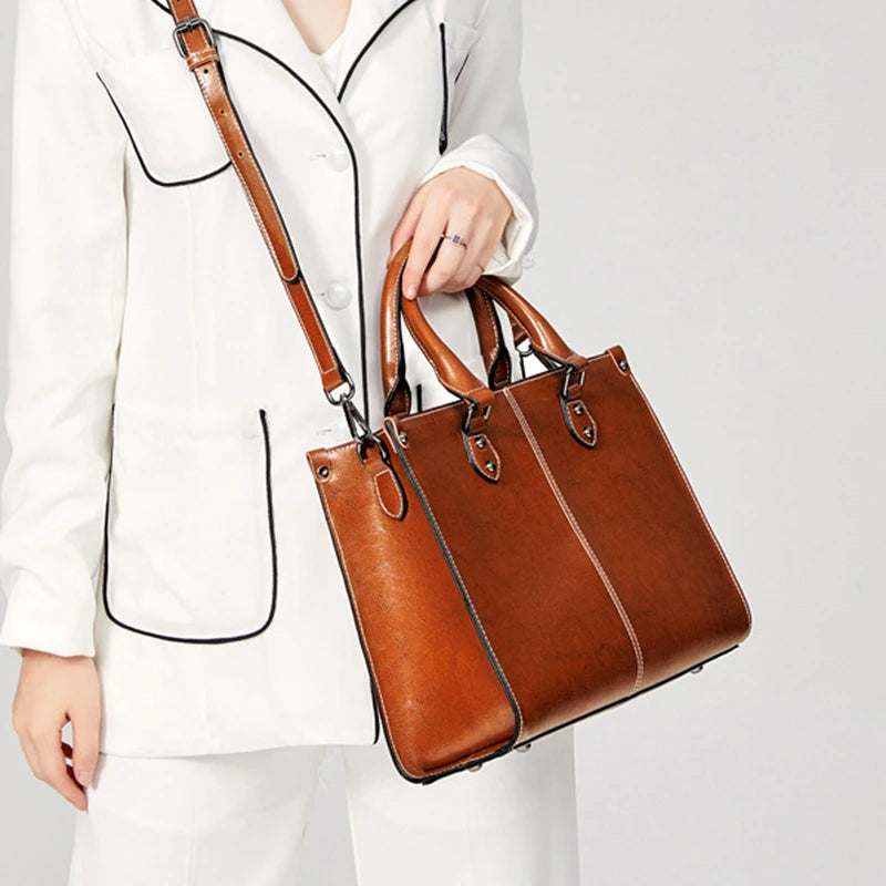 Leather crossbody mini bag in brown, ideal for everyday use