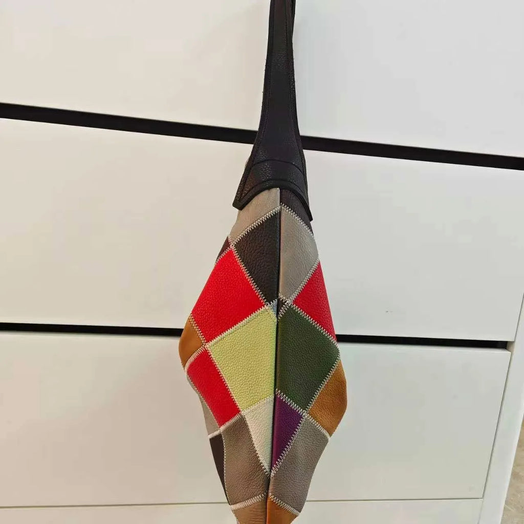 Leather crossbody mini bag with colorful quilted design and adjustable strap