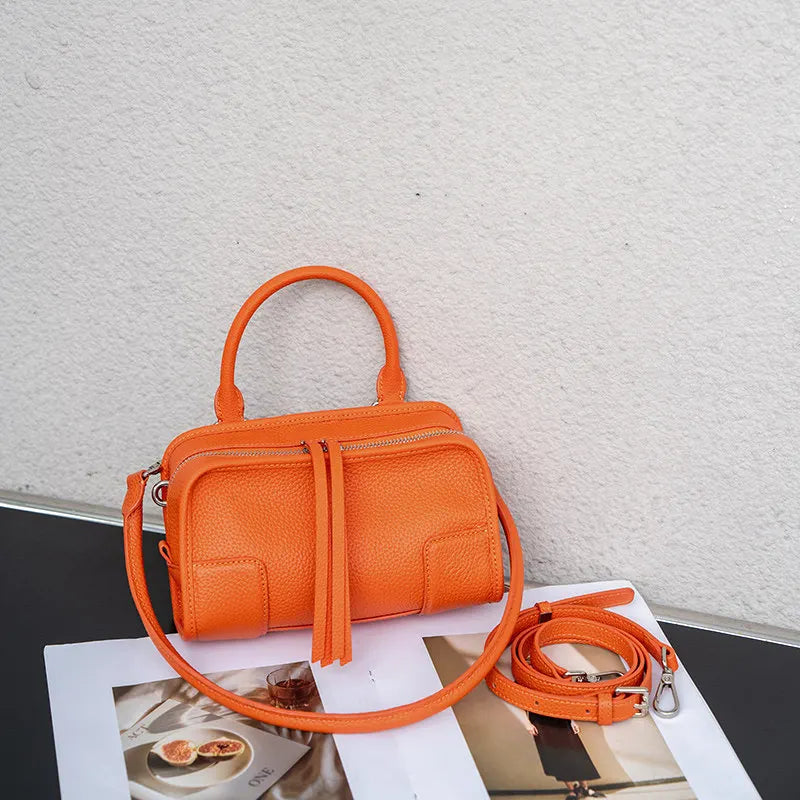 Orange leather crossbody mini bag for stylish everyday use