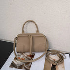 Beige leather crossbody mini bag for stylish outings