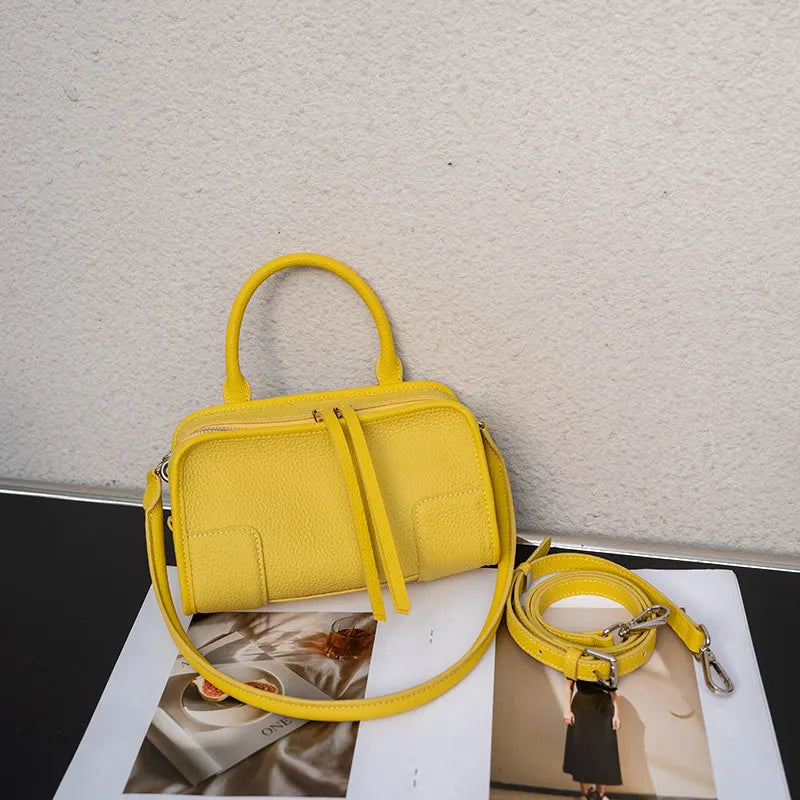 Yellow leather crossbody mini bag with adjustable strap for casual outings
