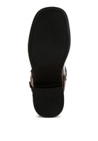The sole of Rag Company leather harness boots for travel showing durable grip and stylish design