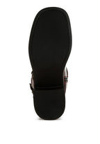 The sole of Rag Company leather harness boots for travel showing durable grip and stylish design
