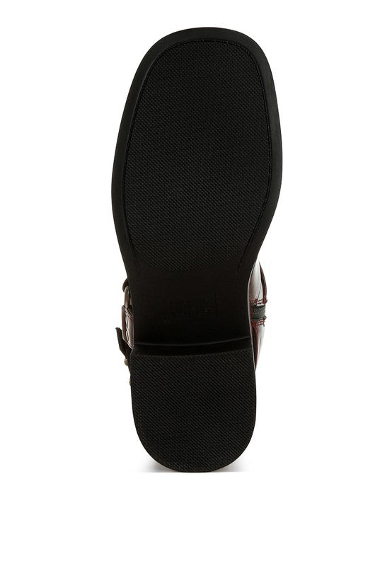 The sole of Rag Company leather harness boots for travel showing durable grip and stylish design
