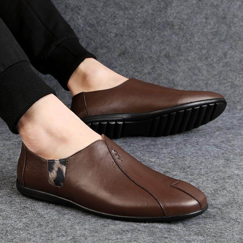 Brown leather loafers for men featuring a sleek design and comfortable fit for casual wear