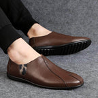 Brown leather loafers for men featuring a sleek design and comfortable fit for casual wear