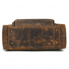Bottom view of a durable leather luggage tote bag with reinforced base for stability and long-lasting use