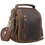 Brown leather messenger bag by VacationGrabs with multiple pockets and adjustable strap