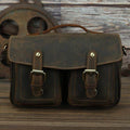 Brown leather messenger bag for photography with dual front pockets and adjustable strap