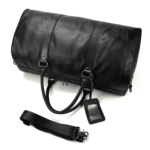 VacationGrabs leather overnight duffel bag in black with adjustable strap and luggage tag