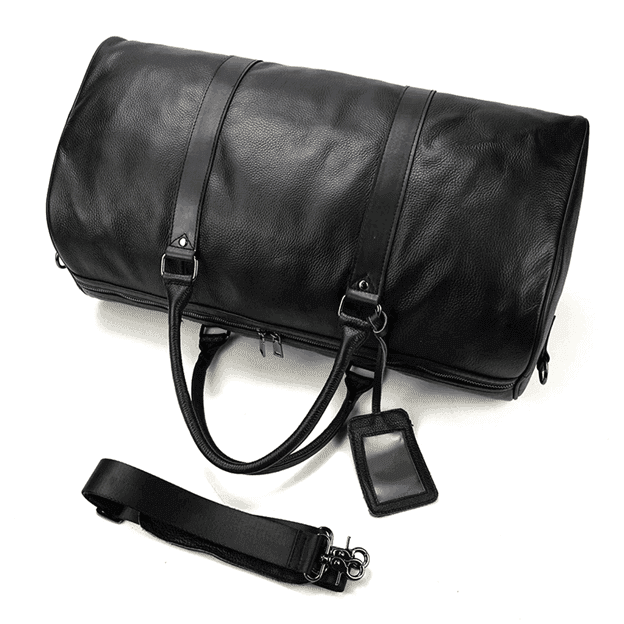 VacationGrabs leather overnight duffel bag in black with adjustable strap and luggage tag