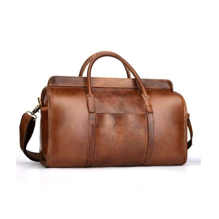 VacationGrabs leather shoulder bag for travel in rich brown leather with sturdy handles and a detachable strap