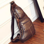Brown leather sling bag for travel with multiple pockets and a stylish design