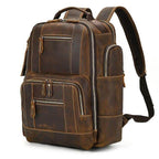 Leather style travel backpack by VacationGrabs with multiple compartments and a sleek design