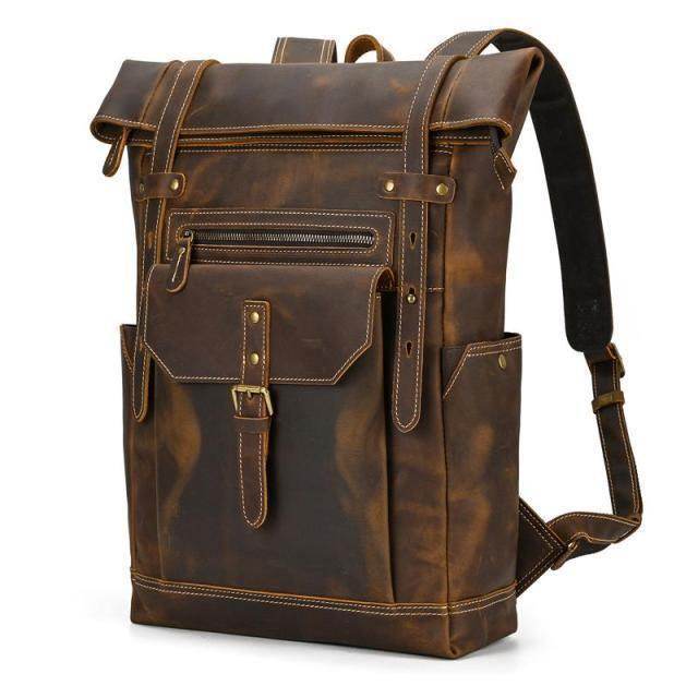 Leather style travel backpack with multiple pockets and adjustable straps for convenience