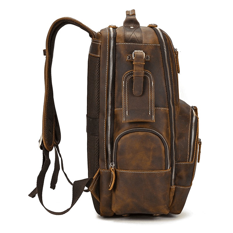 Leather style travel backpack from VacationGrabs with multiple compartments and durable stitching