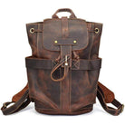 Stylish leather travel backpack with adjustable straps and exterior pockets for easy access