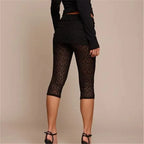 Black women's capri leggings with textured design, perfect for workouts