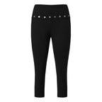 Black capri leggings with stylish button accents, ideal for workouts