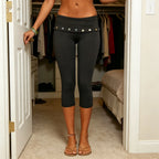 Women's black capri leggings made of stretchy fabric for workouts