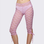 Pink lace leggings with lace detailing for stylish layering