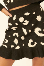 VacationGrabs women's leopard print mini skirt with ruffled hem in black and beige tones