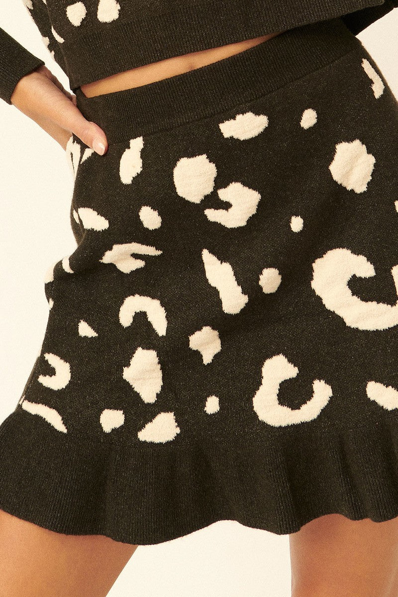 VacationGrabs women's leopard print mini skirt with ruffled hem in black and beige tones