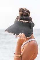 Aili's Corner leopard print sun visor featuring a stylish black design for sunny beach days