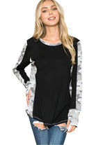 Women's Shirt from Orange Farm Clothing featuring leopard print thumbhole knit sleeves and a black body design
