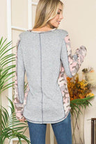 Women's leopard print thumbhole knit shirt with comfortable fit and stylish design