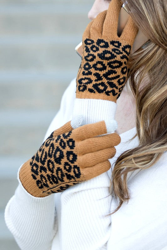 Stylish leopard print touch screen gloves in brown and black, perfect for winter fashion.
