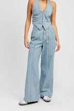 Light blue pinstripe wide leg pants from Emory Park with a stylish high-waisted design
